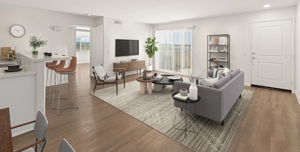 Las Casitas open living concept with a connected kitchen and living room